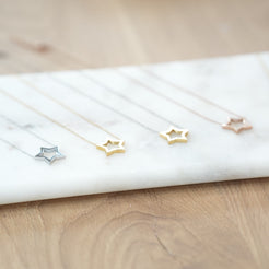 issy star pendant necklaces 