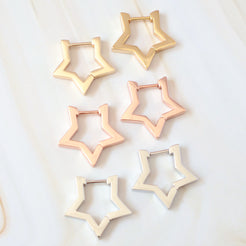 gold, rose gold and white gold star hoops