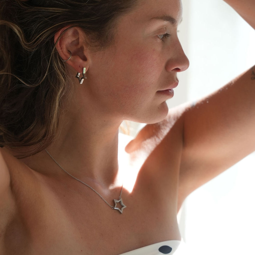 silver issy star earrings and necklace 